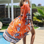 Charlize - Orange floral : Kimono long bohème, fluide et élégant en toute occasion
